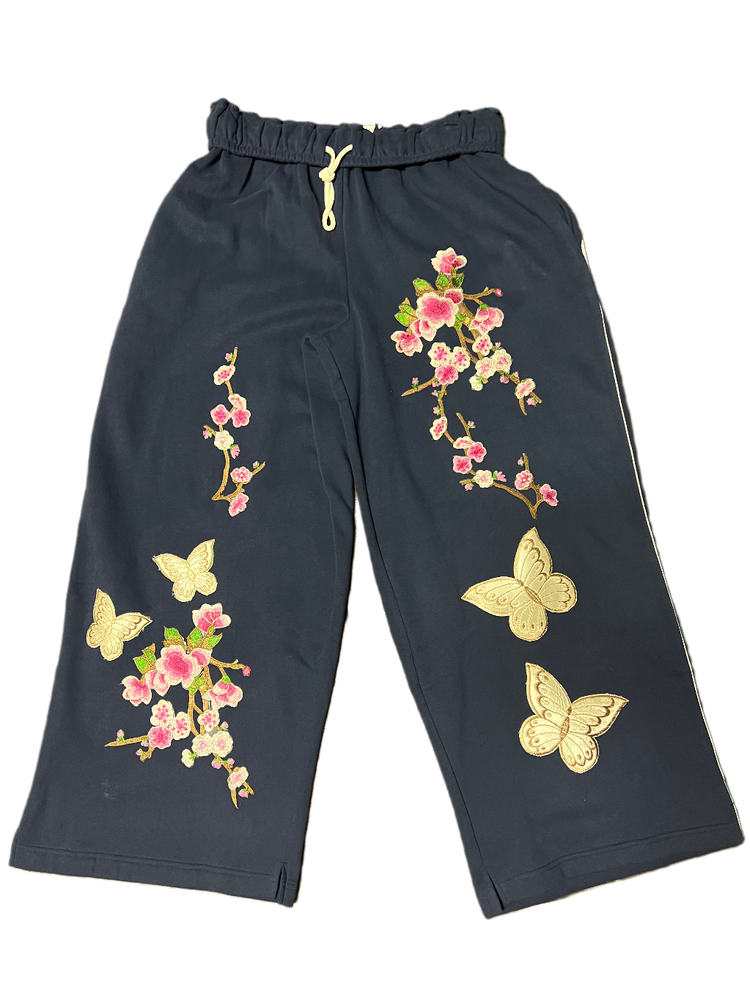 Out From Under blue with butterfly floral accent